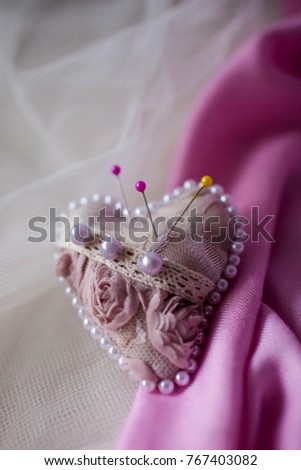 Pink pincushion heart on a light background. Handmade. Stock photo © 