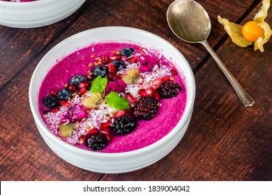 Pink Pitaya Smoothie Bowl With Fruit, Coconut Flakes And Linseed - Healthy Breakfast Idea.