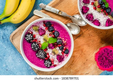 Pink Pitaya Smoothie Bowls With Fruit, Coconut Flakes And Linseed - Healthy Breakfast Idea. Overhead View