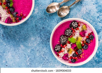 Pink Pitaya Smoothie Bowls With Fruit, Coconut Flakes And Linseed - Healthy Breakfast Idea. Overhead View