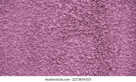 Pink plaster wall , pink background, empty concrete wall, empty space, For use in making a background graphic design.