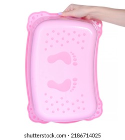 Pink Plastic Baby Step Stool In Hand On White Background Isolation