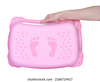 Pink Plastic Baby Step Stool In Hand On White Background Isolation