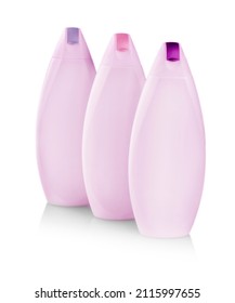 Pink Plastic Bottles With Colored Capes Of Body Care And Beauty Products. Studio Photography Of Plastic Bottle For Shampoo - Isolated On White Background