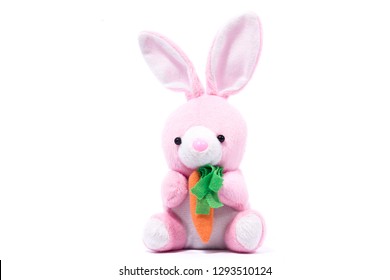 pink plush rabbit with carrot, isolate, festive easter rabbit