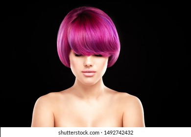 Pink Or Purple Colored Hair Model Portrait On Black Background. Girl Portrait With Pink Colour Hair Style