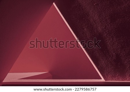 pink purple colorful abstract architecture background. graphics geometric interplay. cement wall intersecting straight lines, empty space huge triangle shape, natural light shadows.  podium designs.