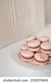 Pink And Purple Macarons In Kitchen