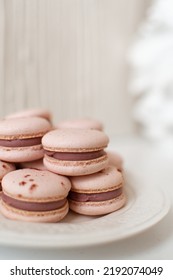 Pink And Purple Macarons In Kitchen