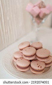 Pink And Purple Macarons In Kitchen