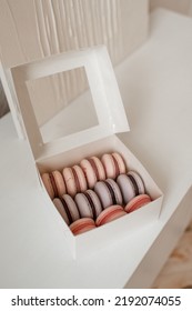 Pink And Purple Macarons In Kitchen