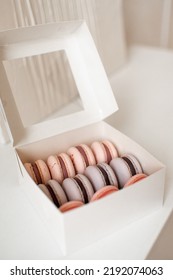 Pink And Purple Macarons In Kitchen