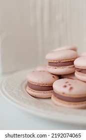 Pink And Purple Macarons In Kitchen