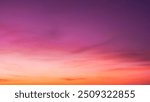 Pink, Purple , Pastel sunset sky Background in the evening after sun down with colorful sunlight on Dusk sky clouds 