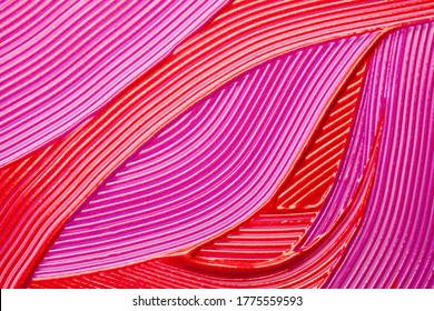 Pink red holographic shimmering smeard lip stick background texture smudge