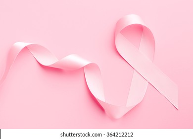 pink ribbon breast cancer on pink background