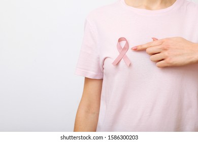 Pink ribbon, the international symbol of breast cancer.
 - Shutterstock ID 1586300203