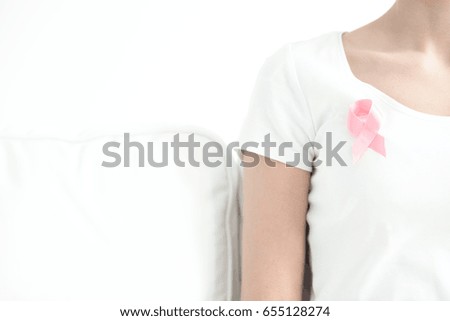Pink ribbon means solidarity with women touched by breast cancer