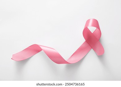 Pink ribbon on grey background. Breast cancer awareness concept - Powered by Shutterstock