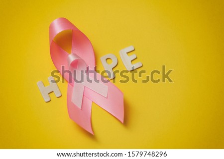 Pink ribbon. Symbol of breast cancer awareness. Health care conception. Preventive measures. October checking time. Women health.Text space.