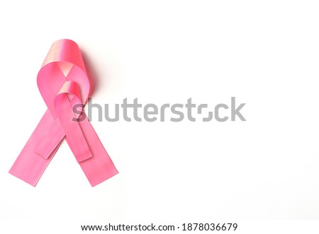 pink ribbon symbolizing the fight against cancer in October