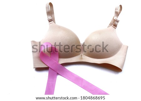 Pink ribbon and women bra symbol of global women's breast cancer campaign.  Breast cancer survivor, pink October, awareness month. Concept for encouragement the women who has been breast cancer.