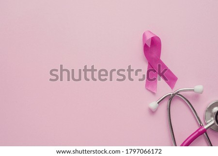 pink ribbons and stethoscope on pink background, Breast cancer awareness and October Pink day