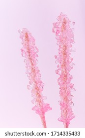 Pink Rock Candy On A Pink Paper Background, Vertical, Closeup