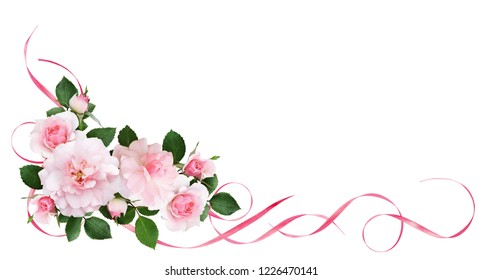 Pink rose flowers, satin ribbons and glitter confetti in a floral corner arrangement isolated on white background. Flat lay. Top view.