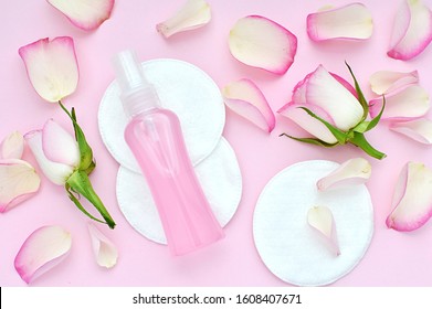 Pink Rose Water Facial Toner, Make Up Remover, Beauty, Spa Product, Roses Petals, Cosmetic Pads, Flat Lay.