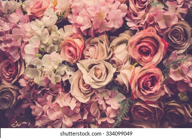 Pink roses background. Retro filter. - Shutterstock ID 334099049