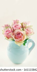 Pink Roses In A Light Blue Vase On Cream Beige Shabby Chic Background With Copy Space