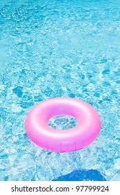 Pink Rubber Ring In Swimming Pool