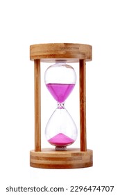 Pink sand hourglass on white background 