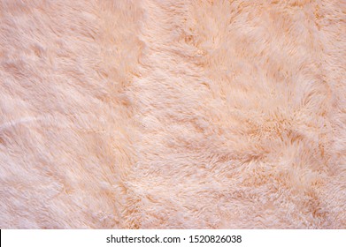 Pink Shaggy Blanket Texture As Background. Fluffy Fake Textile Fur.