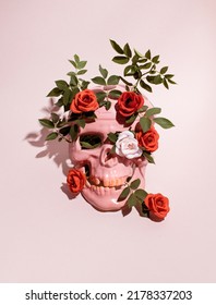 Pink Skull Mask Decorated With Green Leaves And Red Roses, Creative Goth Style Layout. 