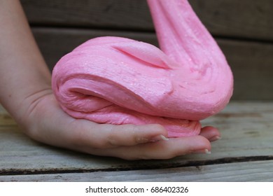 Pink Slime In Kid's Hands