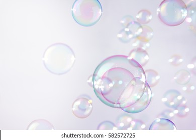 Pink soap bubbles float background - Shutterstock ID 582572725