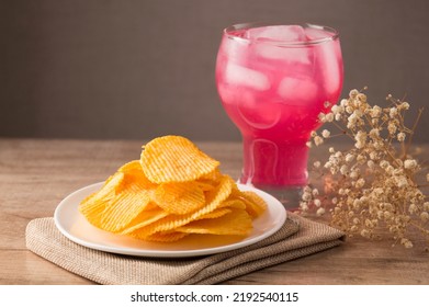 
Pink Soft Drinks And Crisps	
