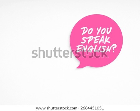 Pink speech bubble with the question Do you speak English? Written inside, suggesting communication and language learning