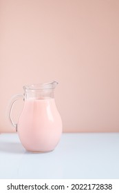pink strawberry milk in jug sweet drink cocktail