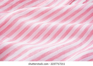 Pink striped linen cloth fabric background