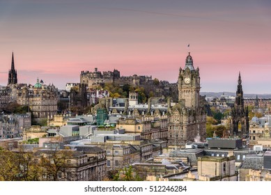 Pink sunrise over the city of Edinburgh - popular cityscape of the historical town center with the view towards Edinburgh castle 