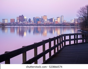 Pink sunset across the Charles River in Boston