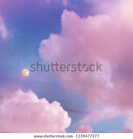 Pink sunset clouds sky with full moon and stars. Dream magic evening sky with moon clouds. Blue hours sky