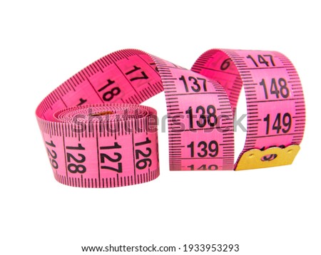Pink tape measure roll isolated on the white background