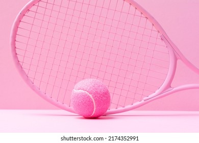 Pink tennis racket and pink ball on pink background. Horizontal sport theme poster, greeting cards, headers, website and app
 - Powered by Shutterstock