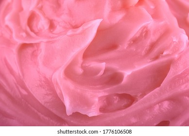 Pink texture of cream background, copy space. Top view, flat lay