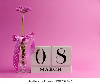 Pink Theme, Save The Date White Block Calendar For International Women's Day, March 8, Decorated With Flower, Vase And Polka Dot Ribbon.