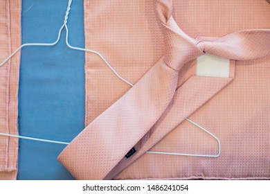 Pink Tie Half Windsor Knot With Hanger.